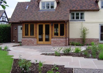 Sandstone path through garden